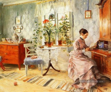 Un intérieur avec une femme qui lit Carl Larsson Peinture à l'huile
